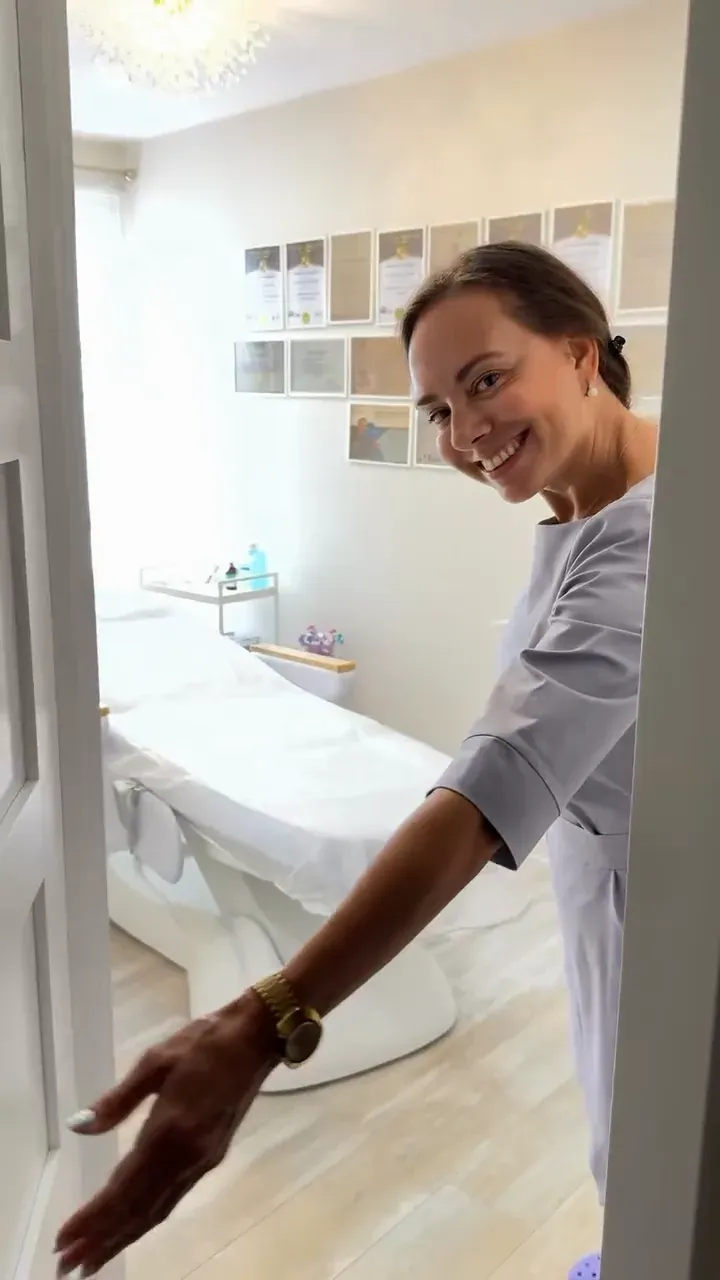 Dr Olha Zvelindovska welcoming you into her clinic